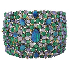 Mesmerizing Opal, Diamonds, Emerald and Tanzanite Cuff Bracelet