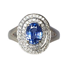 Vivid Ceylon Blue Sapphire and Diamond 18 Karat White Gold Cluster Cocktail Ring