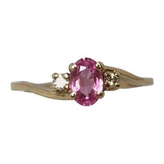 Oval Cut Pink Sapphire and Diamond 3-Stone Yellow Gold Three-Stone Ring