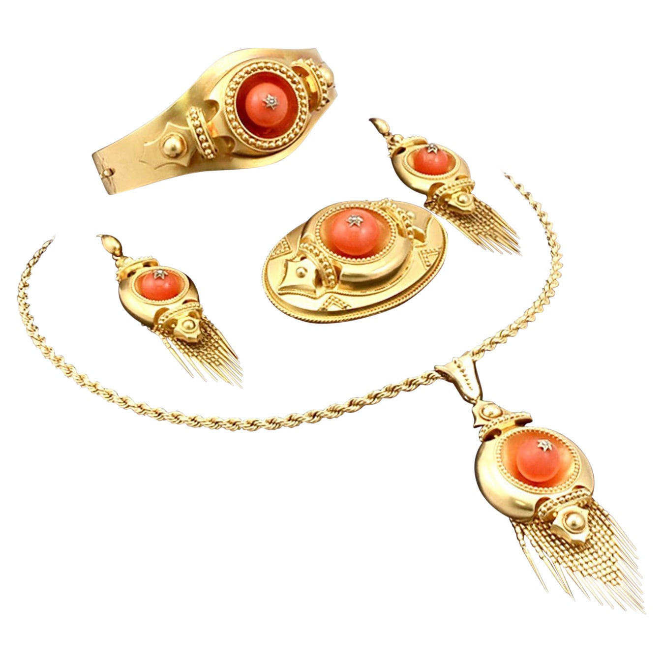 A stunning, fine and impressive antique Victorian 22 karat yellow gold, 20.25 carat coral and 0.05 carat diamond jewelry set (necklace, bangle, brooch and earrings); part of our antique jewelry and estate jewelry collections.

This stunning antique