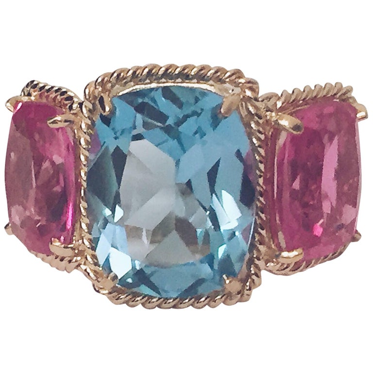 Blue and Pink Topaz Gold Three Stone Ring with Rope Twist Border For Sale