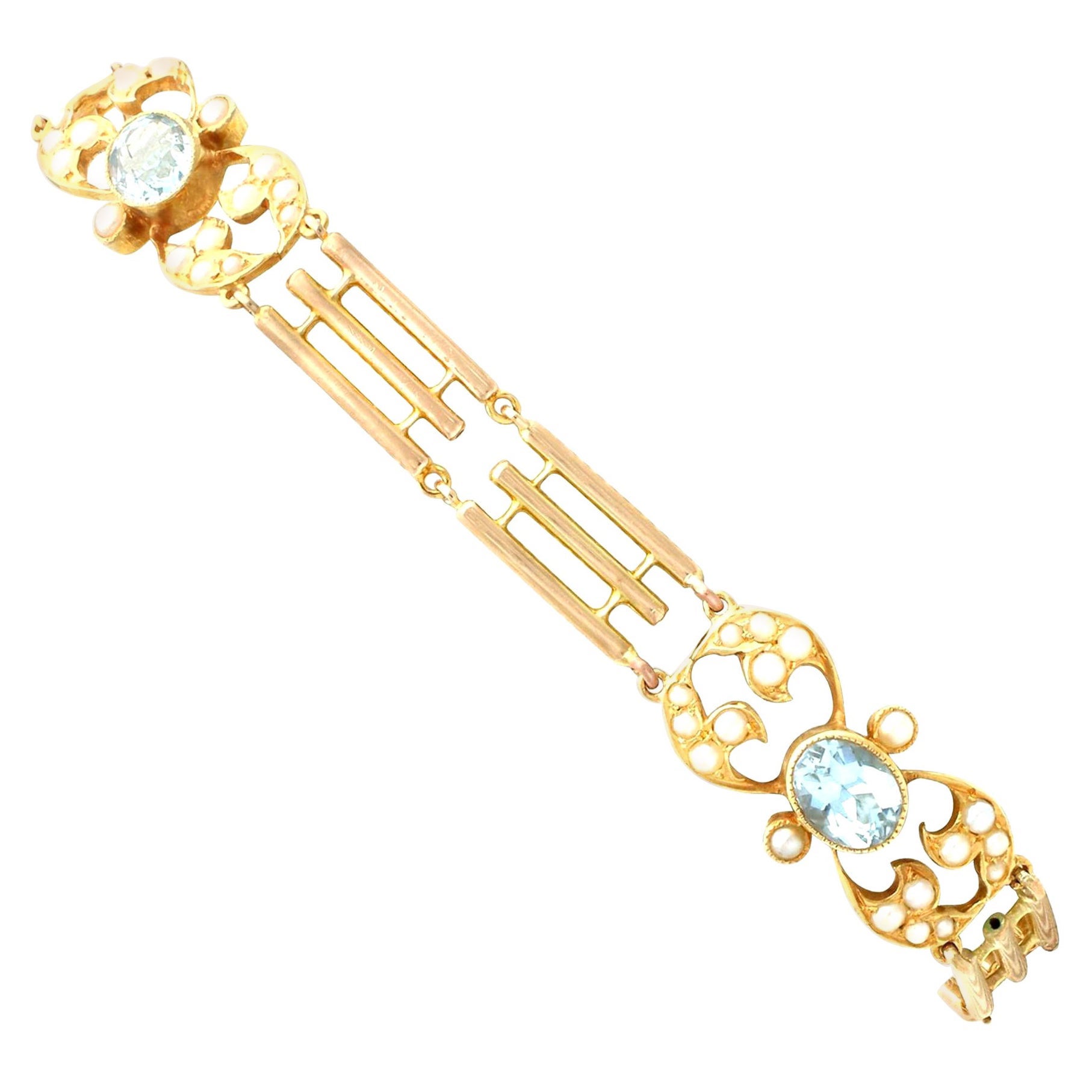 1920s 2.55 Carat Aquamarine and Seed Pearl Yellow Gold Gate Bracelet
