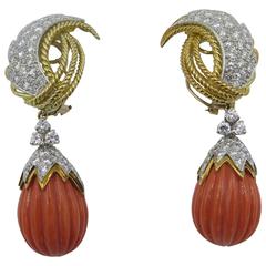 A Pair of Platinum, Diamond and Coral Earrings.