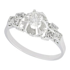 Anillo de compromiso antiguo de diamantes y platino de los años 20