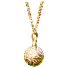 9ct gold chain with gold orb
