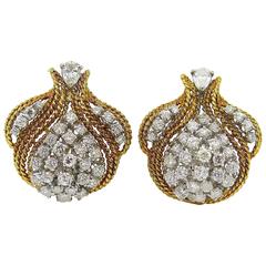 A Chic Pair of Platinum, Diamond and Gold Earrings.