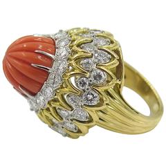 A Beautiful Carved Coral, Platinum, Diamond and Gold Ring.