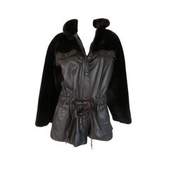 Christian Dior Jacke aus braunem Leder und Pelz mit Gürtel