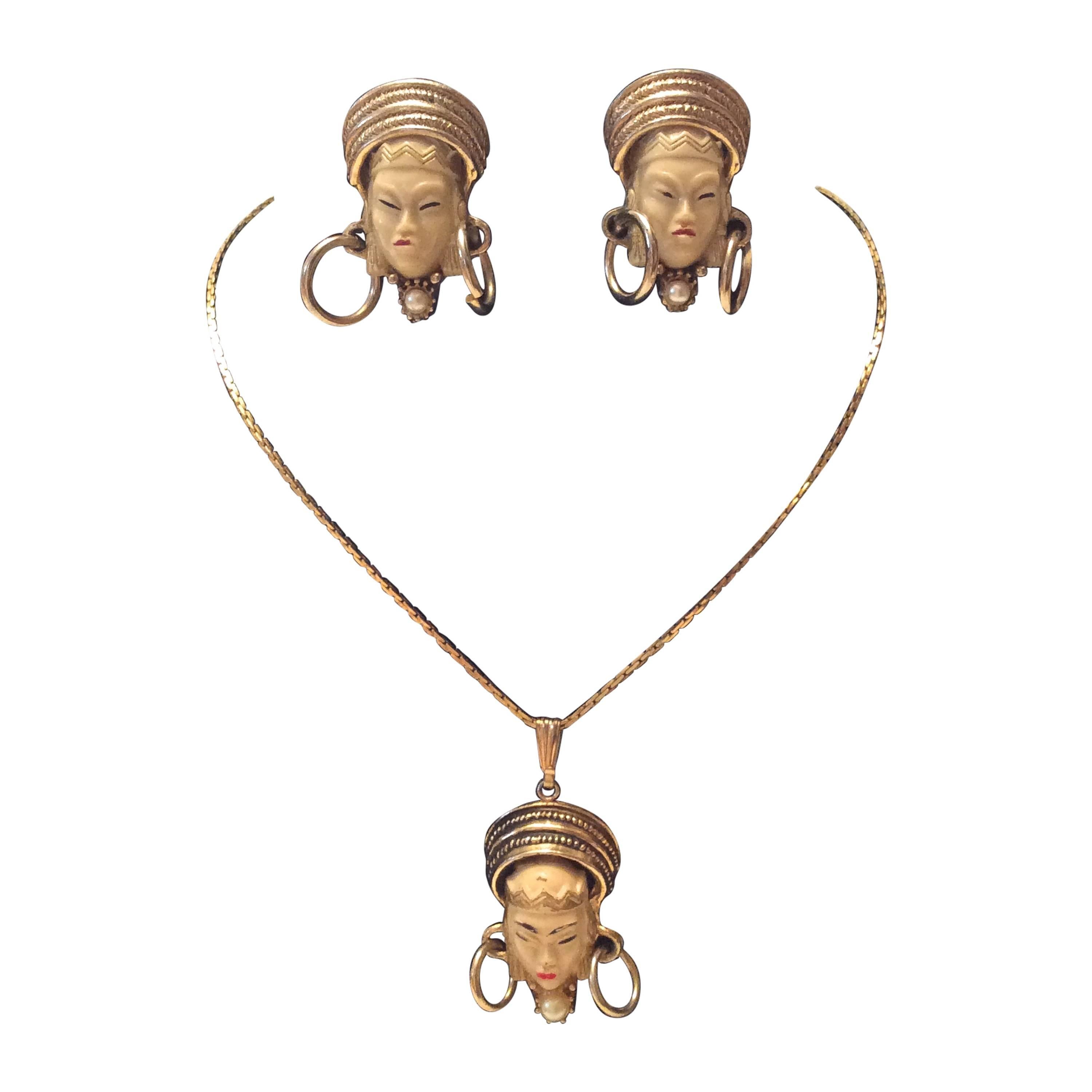 Vintage Selro Selini Asian Faced Gold Tone Necklace and Earrings For Sale