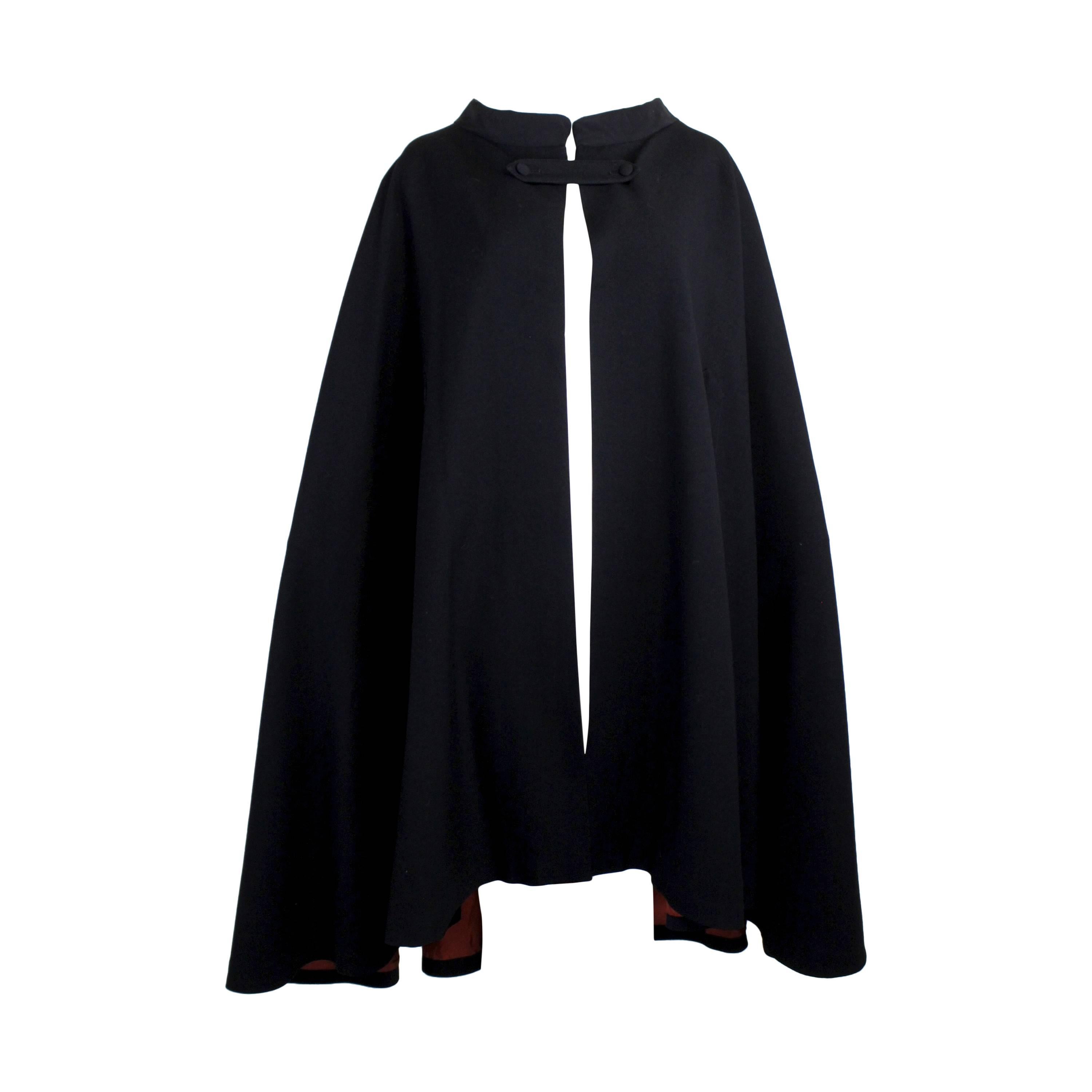1960s Pierre Cardin Iconic Black Wool Cape with Silk Lining For Sale