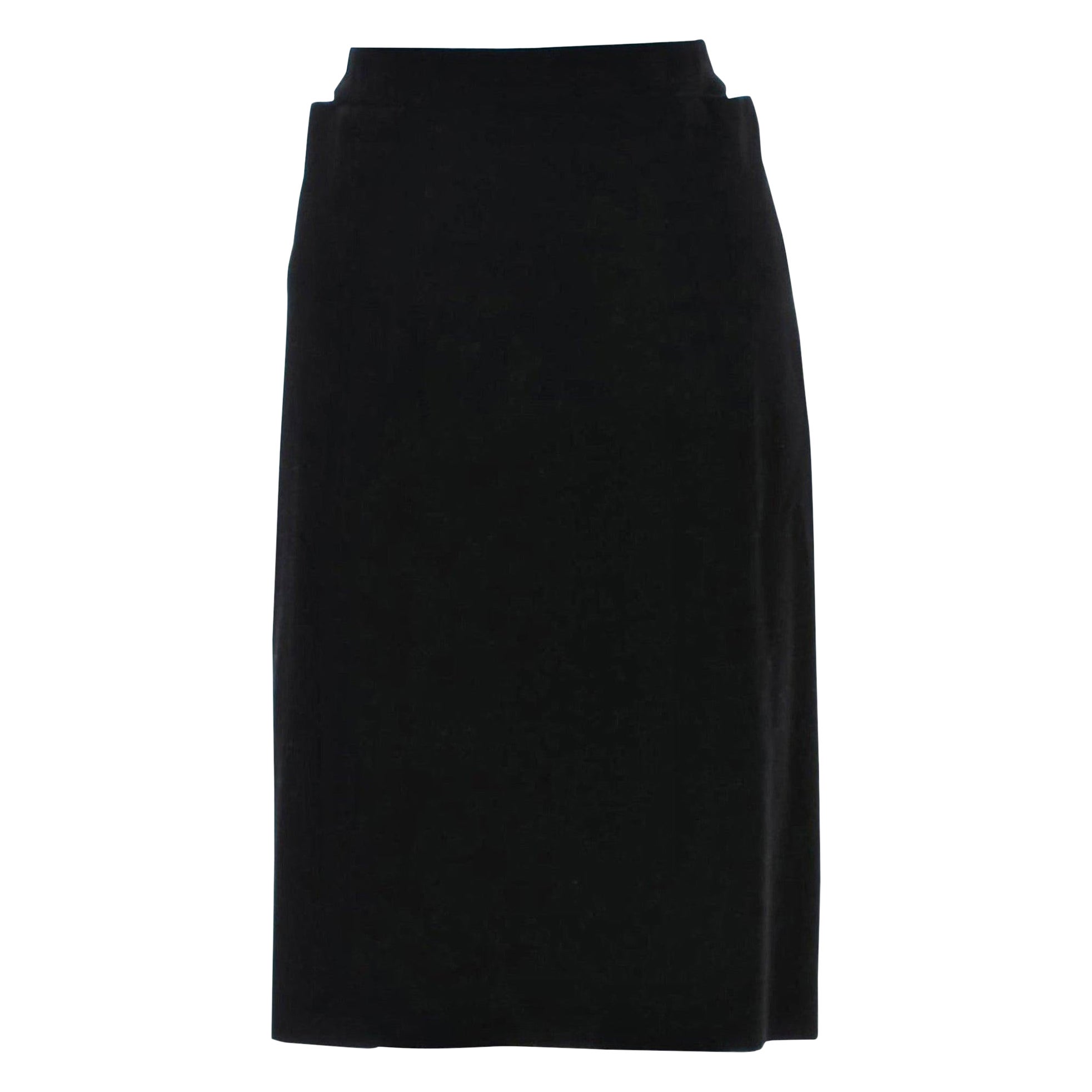 Tom Ford For Yves Saint Laurent
Size: FR40

Tom Ford's Coveted 2001 Winter Collection Runway Skirt

Impossible to Find New
Brand New Without Tags
Black Velvet
Zipper and Hook & Eye closure at Back
Slit Front Pockets
Vent Back
Two Buttoned Back