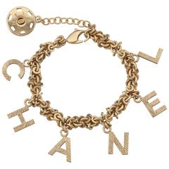 Vintage Chanel Charm Bracelets 55 For At 1stdibs 2003 Chanel Gold Tone Link Charm Bracelet Spelling C H A N E L