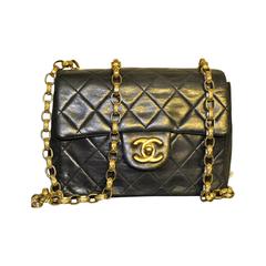 1990s Chanel mini flap black bag