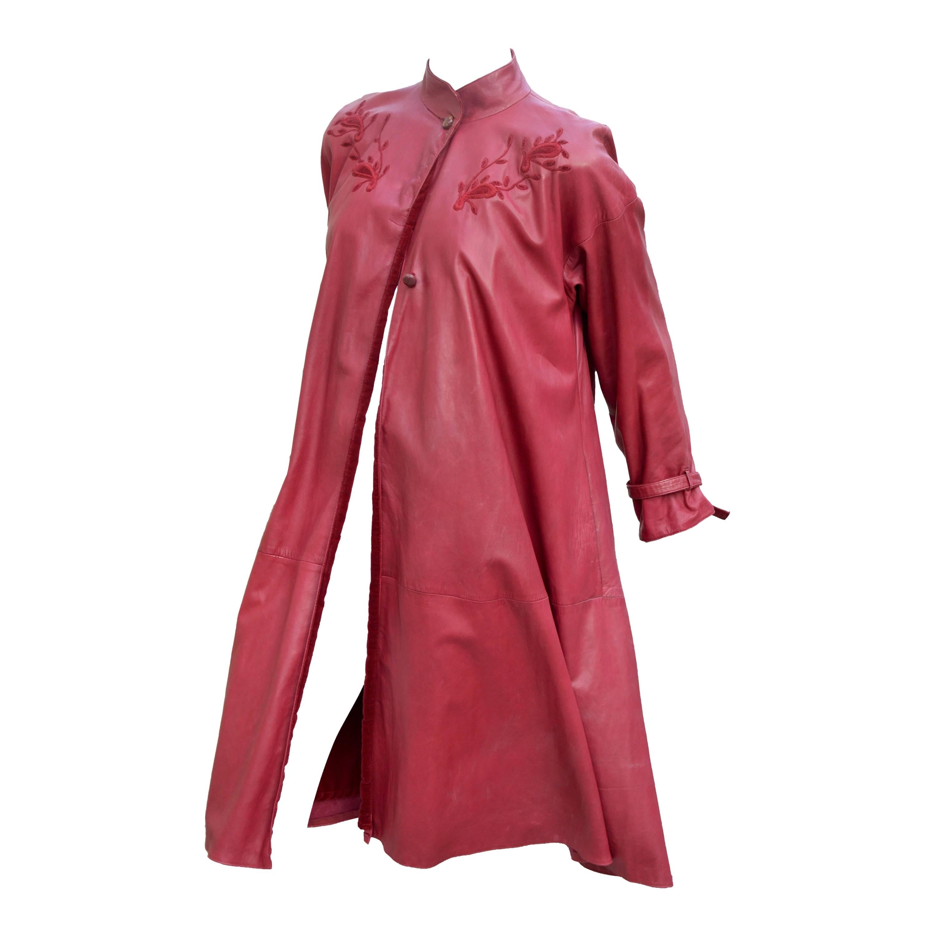 Ultra-soft, and supple, lambskin leather fabrication featuring toning discreet but noticeable delicate floral embroideries, Two side pockets,Fully lined with deeper red silk velvet.
Condition: Very good, shows very little signs of wear. This is a