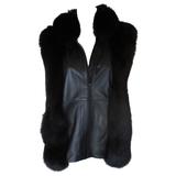 Gilet senza maniche in pelle nera con collo in pelliccia di volpe nera