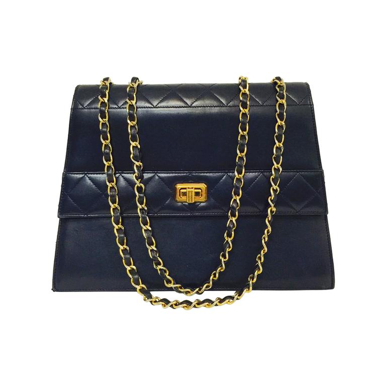 1980s Chanel Navy Trapezoid Handbag With Matching Wallet at 1stDibs