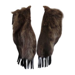 Used sleeveles trendy raccoon fur vest