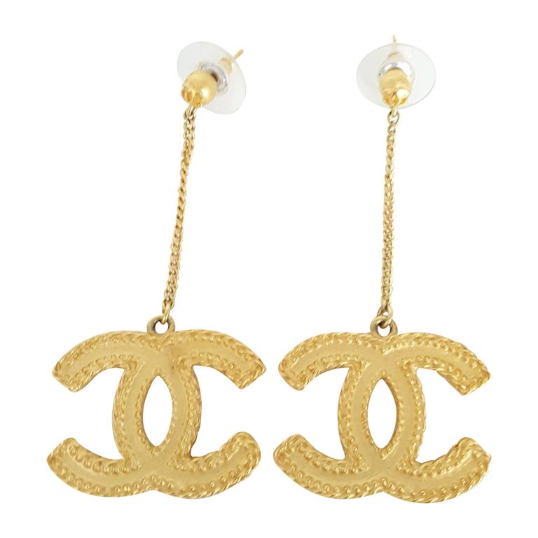 Chanel CC Logo Hanging Earrings From 2013 In Soft Gold Tone.