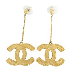 Chanel "CC" Logo Hanging Earrings From 2013 In Soft Gold Tone.