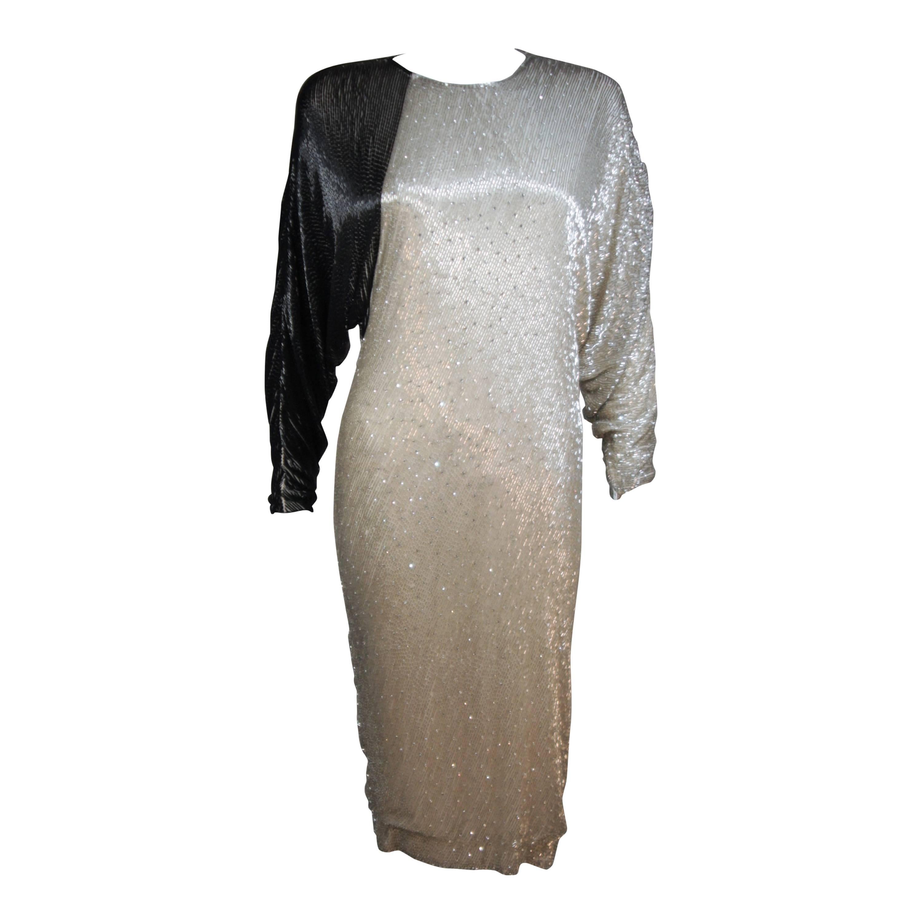 1980's Vintage Black & Silver Silk Cocktail Dress with Batwing Sleeves SIze 4-6 For Sale