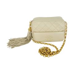 Chanel Small Cream Lambskin Camera Bag Tassel And Gold Hardware  Mint.