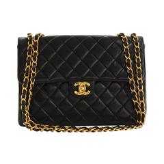 1990s Chanel Black Quilted Lambskin Vintage Jumbo Classic Single Flap Bag