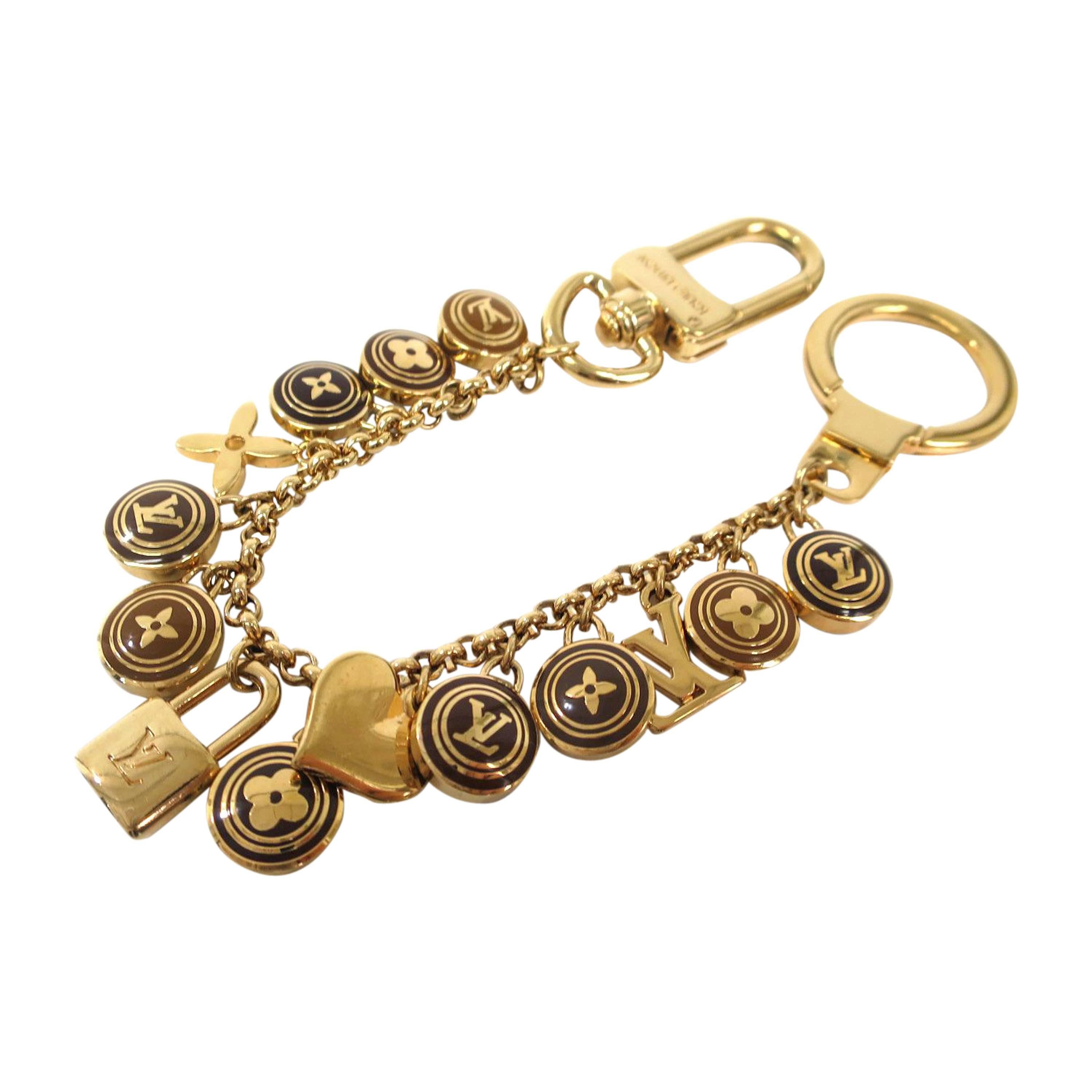 Louis Vuitton Gold Tone Logo Lock Key Bag Charm Chain