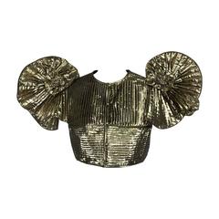 Novelty winged shoulder bolero in gold lame 1980s