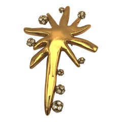 Christian Lacroix star brooch with glittering balls, gold toned Resin 1980/90s