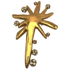 Retro Christian Lacroix star brooch with glittering balls, gold toned Resin 1980/90s