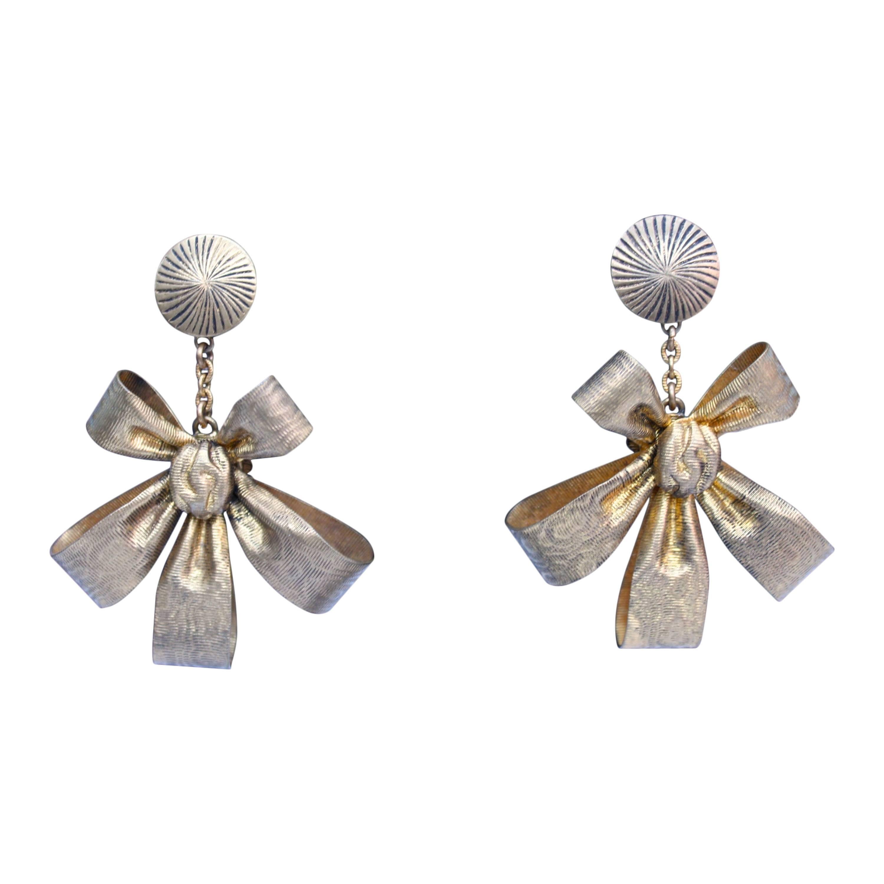 1965s Yves Saint Laurent Gilt Bow Shape Dangling Earrings For Sale