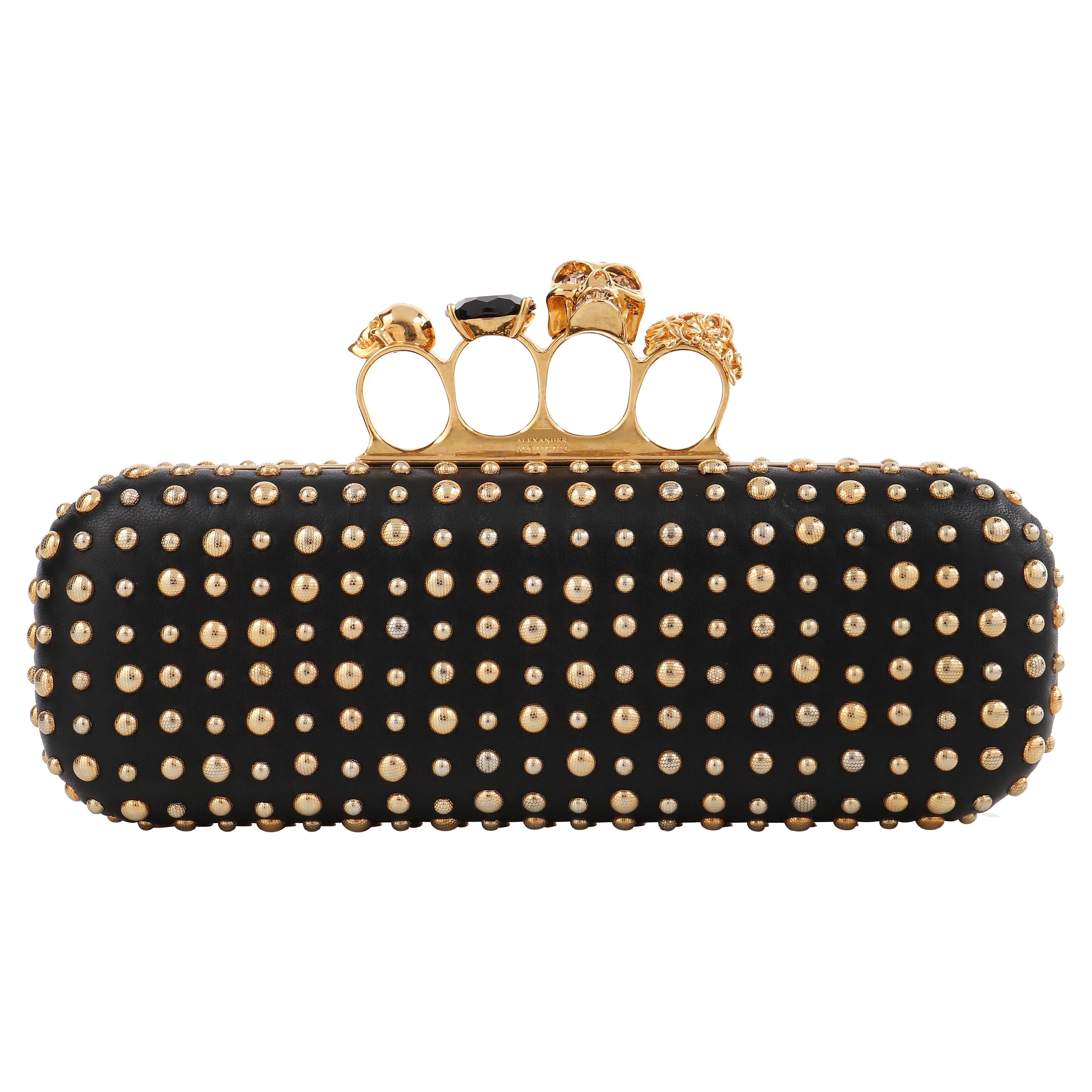 ALEXANDER MCQUEEN A/W 2010 Gold Studded Leather Four-Ring Skull Knuckle Clutch  For Sale