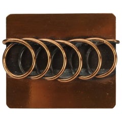 Moderne Kupferspiralen-Brosche/Anstecknadel mit geometrischen Rebajes, Mitte des Jahrhunderts  