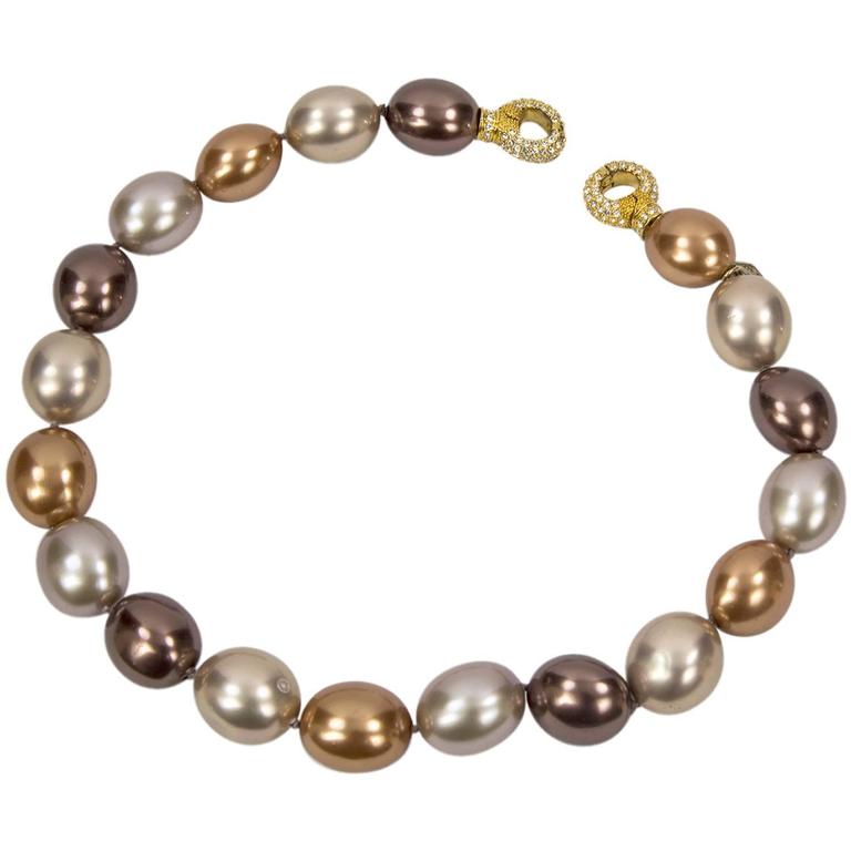 Faux Tahitian South Sea 18 x 20mm Exotic Multi Color Oval Pearl Necklace For Sale at 1stdibs