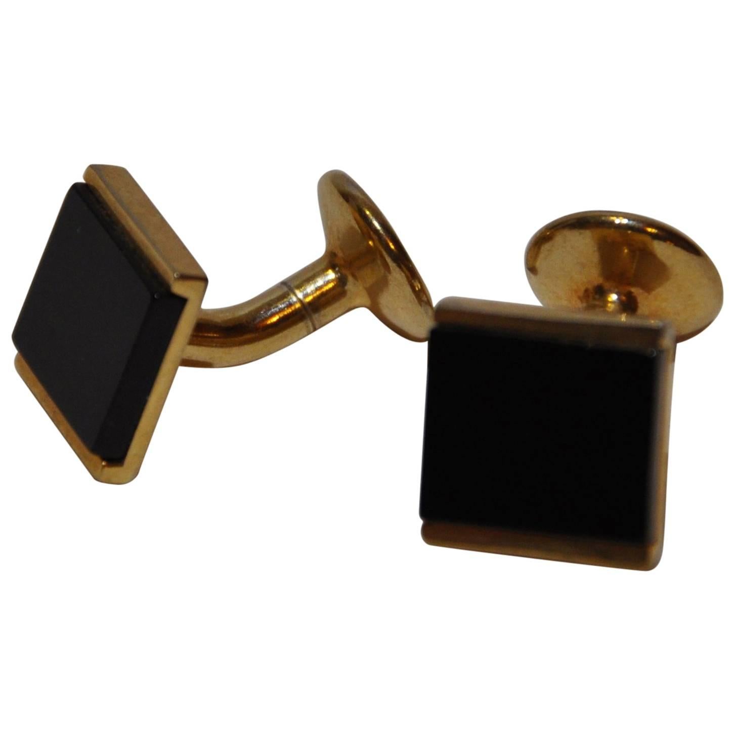 Thick Polished Gold Tone Hardware Accented with Onyx Cuff Links  For Sale