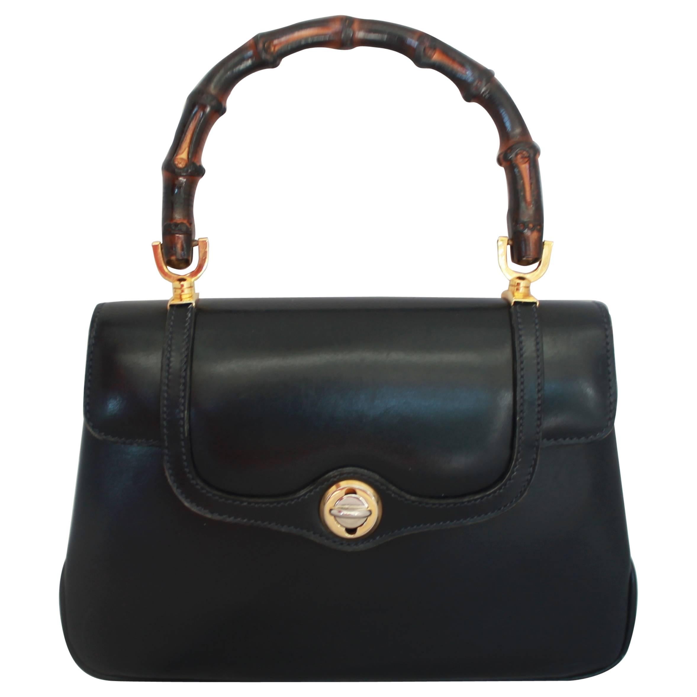 Bolso vintage Gucci de piel azul marino con asa de bambú - circa años 50