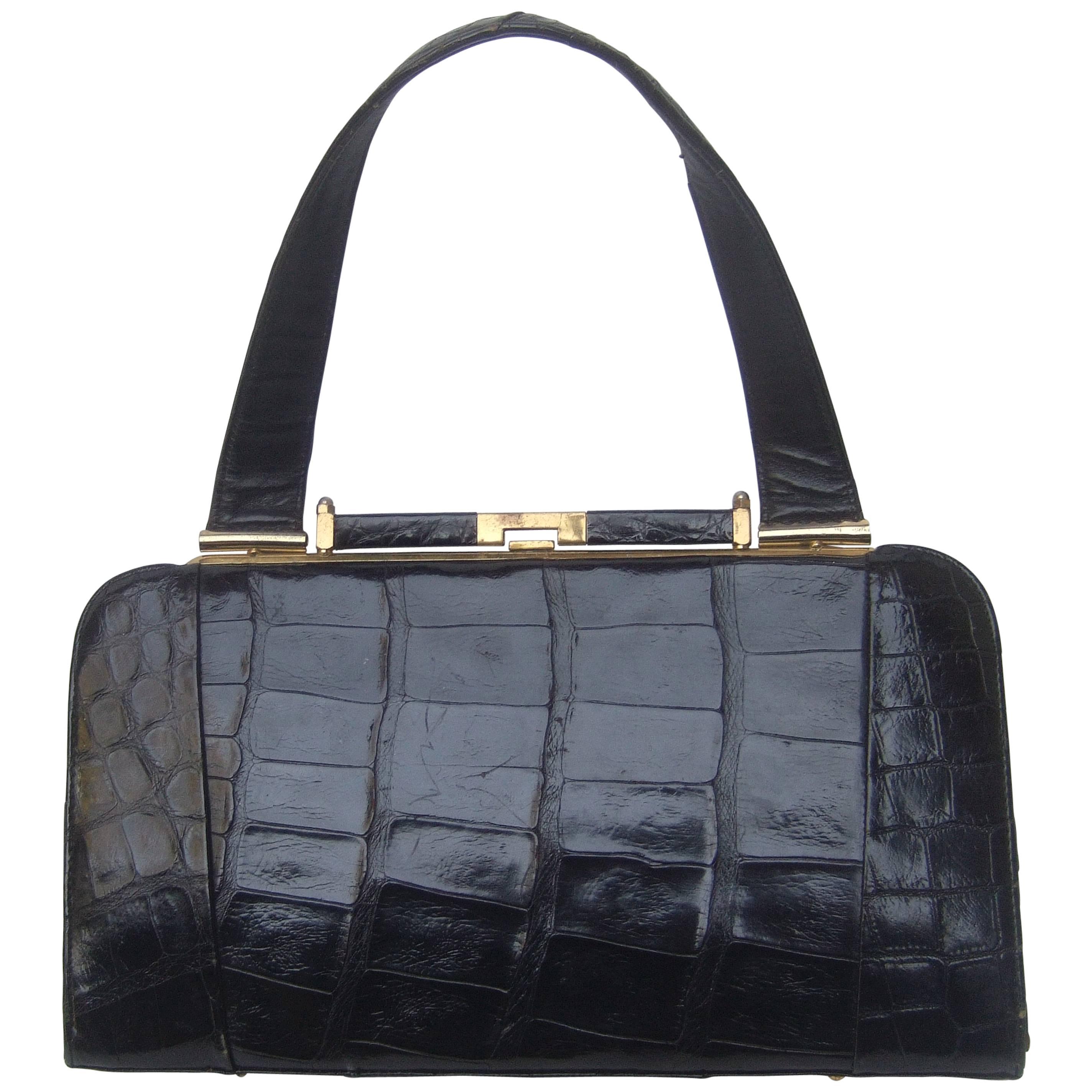 Sleek Ebony Alligator Leather Vintage Handbag ca 1960 For Sale