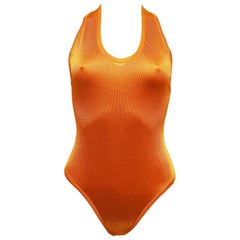 Alaia knitted orange bodysuit with cross over back, c. 1990s