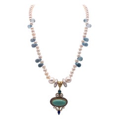 A.Jeschel  Lustrous Pearls between Blue Topaz teardrops necklace.