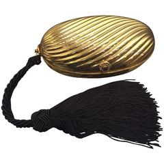 1980s Saks Fifth Avenue Gold-Tone Ribbed Minaudière with Tassel Handle 