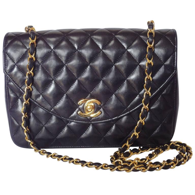 1980s vintage Chanel black lamb leather 2.55 classic oval flap