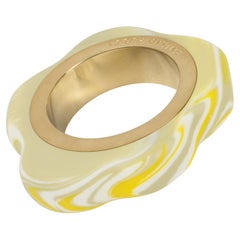 Bracelet jonc en résine jaune, blanc et gris effet marbre Emilio Pucci