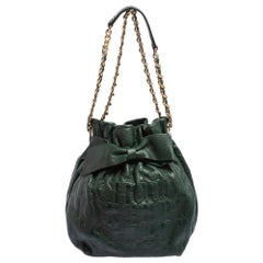 Carolina Herrera Dark Green Monogram Embossed Leather Bow Bucket Shoulder Bag