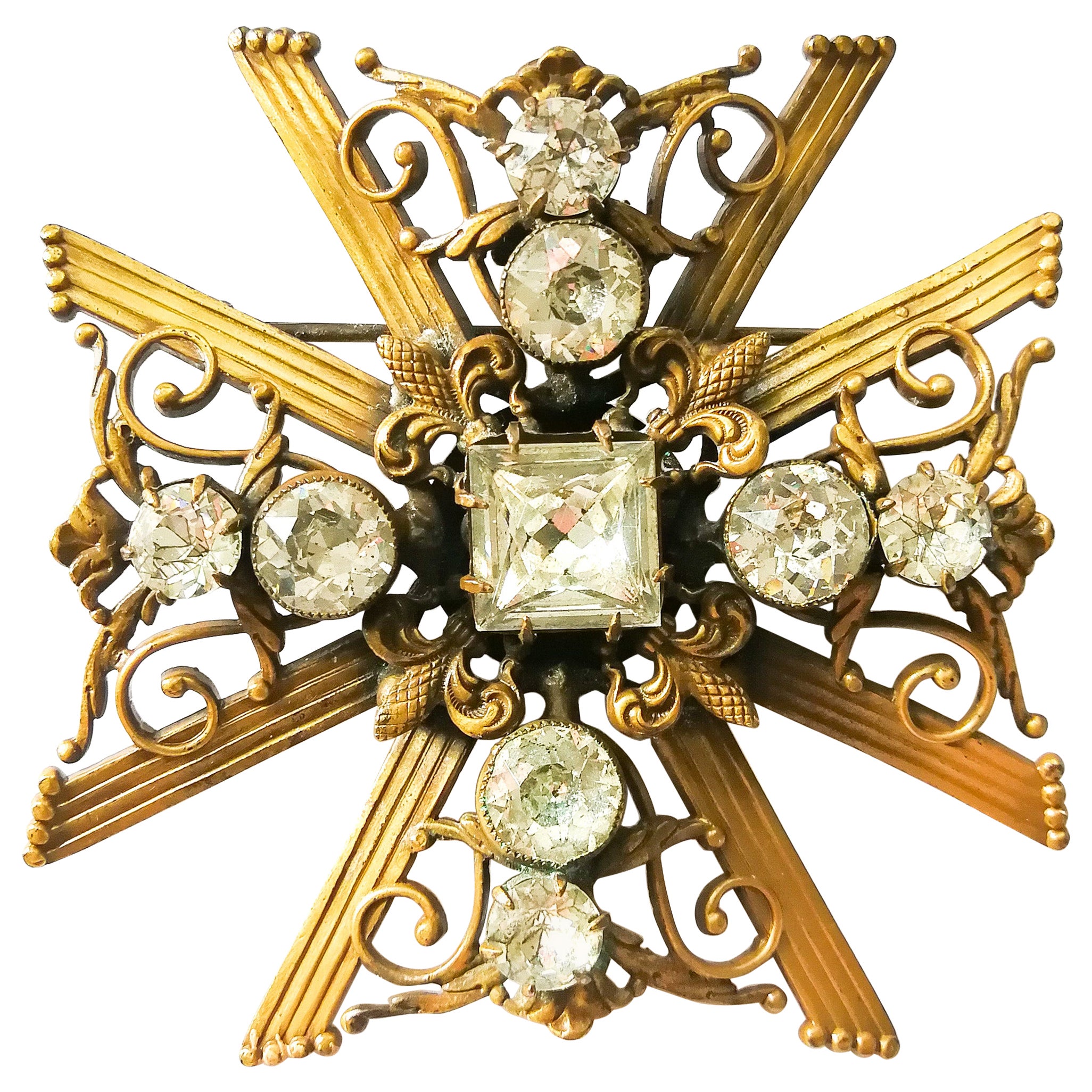 A large gilt and crystal brooch, as a Maltese Cross, Joseff of Hollywood, 1940s For Sale