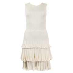 CHRISTIAN DIOR - Robe en maille sans manches TIERED RUFFLED en viscose blanc cassé 38 S.