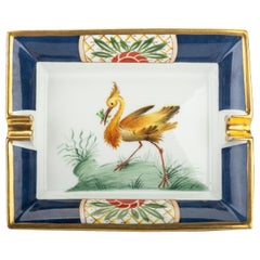 Hermès Cendrier oiseau en porcelaine bleu or