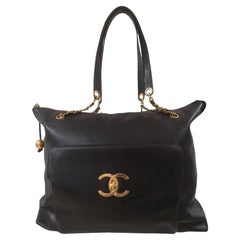 Chanel black leather gold hardware CC logo shoulder bag