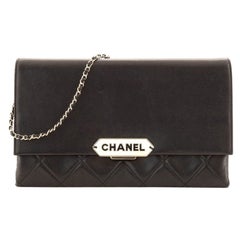 Chanel Retro Label Chain Clutch Gestepptes Lammleder