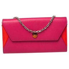 Portefeuille Dior Addict Rendez-Vous en cuir rose/orange sur chaîne