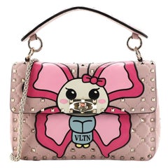 Valentino Rockstud - Sac à rabat à pointes en cuir imprimé matelassé - Moyen
